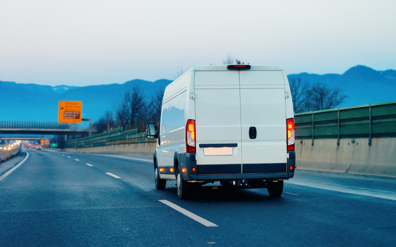 van driving on highway